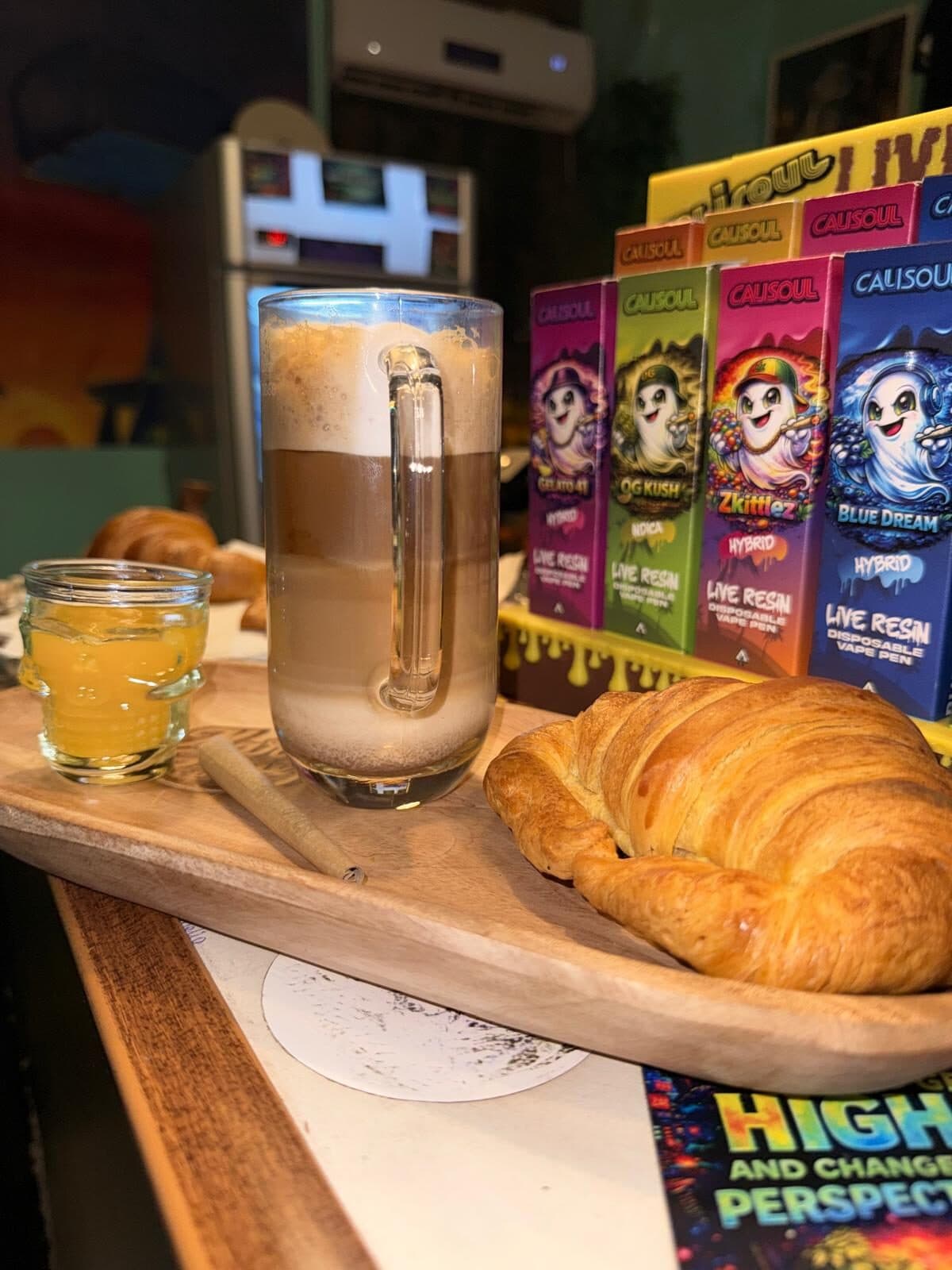 Coffee tray against the colourful product shelf